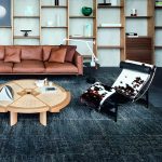 "Ergonomic Metal Recliner with Legs, Ideal for Modern Style and Small Spaces - Black Genuine Leather"