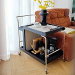 "Elegant 2 Tiers Cream Pu Chairside Table with Roller Wheels for Drawing Room - Black"